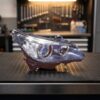 Faro Anteriore Destro BMW Serie 5 2003+ – Modello E60 Bixeno Con Luce Diurna A Led Con Motore Parabola Nera sul banco officina