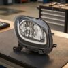 Faro Anteriore Destro Smart Fortwo 2014+ – Parabola Nera C/Luce Diurna A Led High Line sul banco officina