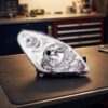 Faro Anteriore Destro Suzuki Splash 2008+ sul banco officina
