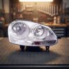 Faro Anteriore Destro Volkswagen Golf V - Jetta 2005+ sul banco officina