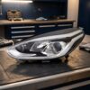 Faro Anteriore Sinistro Ford Fiesta 2017+ – C/Luce Diurna A Led C/Motore sul banco officina