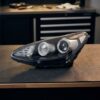 Faro Anteriore Sinistro KIA Sportage 2016-2017 sul banco officina