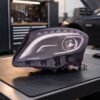 Faro Anteriore Sinistro Mercedes Gla X156 2013-2016 – Bixenon C/Motore Parabola Nera A Led sul banco officina