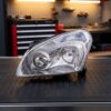 Faro Anteriore Sinistro Nissan Qashqai 2007-2009 sul banco officina