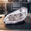 Faro Anteriore Sinistro Renault Clio 2005-2008 - Parabola Cromata sul banco officina