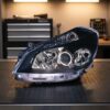 Scheinwerfer Links Renault Clio 2005-2008 - Schwarzer Reflektor – M/Linsenoptik Schwarzer Reflektor – Bild 2