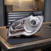 Faro Anteriore Sinistro Volkswagen Touran 2006-2014 sul banco officina