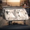 Faro Destro H7-H1 Per Volkswagen Polo 10/99-9/01 ricambio originale Hella sul banco officina