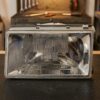 Faro fanale proiettore sinistro per Fiat Regata 83>86 sul banco officina