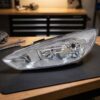 Faro fanale proiettore sinistro per Ford Focus 2/14> Con Motore Elettrico sul banco officina