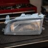 Faro fanale proiettore sinistro per Toyota Corolla 5/92>4/97 sul banco officina